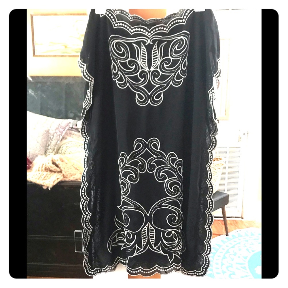 Adorable bathing suit cover up.